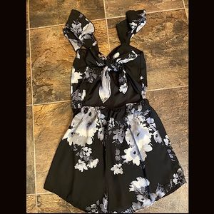 One of my favorite rompers!! Very cute and suitable!